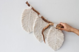 boho-style-close-up-person-working-dreamcatcher